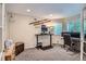Functional home office with dual monitor setup and French doors at 1851 S Marshall Cir, Lakewood, CO 80232