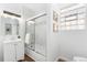 Modern bathroom features a shower and tub combination, with a stylish vanity at 3800 Umatilla St, Denver, CO 80211