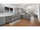 Spacious kitchen with modern cabinetry, subway tile backsplash, and an open layout at 3800 Umatilla St, Denver, CO 80211