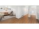 Inviting living room features warm wood floors and a comfortable seating area at 3800 Umatilla St, Denver, CO 80211