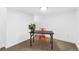This is a clean office space with table and chair at 3800 Umatilla St, Denver, CO 80211