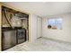Bright laundry room with modern washer and dryer, storage and bright window at 13072 Westlake Pl, Broomfield, CO 80020