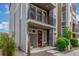 Beautiful home boasts a front entrance with a balcony and modern design elements at 15843 E Broncos Pl, Englewood, CO 80112
