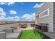 Rooftop patio with outdoor dining and lounging areas with panoramic views at 15843 E Broncos Pl, Englewood, CO 80112