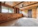 This is a finished basement with wood paneling and exposed ceiling at 4202 Greenbriar Blvd # 46, Boulder, CO 80305