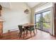 Bright dining area with natural light, features sliding glass doors leading to a deck for easy indoor-outdoor living at 4202 Greenbriar Blvd # 46, Boulder, CO 80305