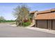 Charming townhome shows an attached garage, mature trees, and a well-maintained lawn in this quiet neighborhood at 4202 Greenbriar Blvd # 46, Boulder, CO 80305