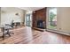 Inviting living space with hardwood flooring, fireplace, and natural light creates a comfortable atmosphere at 4202 Greenbriar Blvd # 46, Boulder, CO 80305