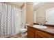 Well-maintained bathroom with a shower-tub combo and a single-sink vanity, offering functionality and comfort at 7341 Grady Cir, Castle Rock, CO 80108