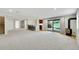 Finished basement featuring a bar area, fireplace, and walkout access to the backyard at 7583 S Xanthia Ct, Centennial, CO 80112