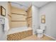 Bathroom highlighting tile accents, a soaking tub and built in shower at 7583 S Xanthia Ct, Centennial, CO 80112