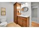 Bathroom showcasing a vanity with storage and a large linen closet at 7583 S Xanthia Ct, Centennial, CO 80112