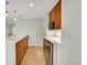 Basement kitchenette featuring stainless steel appliances and modern lighting at 7583 S Xanthia Ct, Centennial, CO 80112
