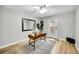 Office space with a large mirror, desk and outdoor access at 7583 S Xanthia Ct, Centennial, CO 80112