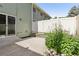Backyard patio and green space with privacy fence and access to the home at 1707 Ostia Cir # 46, Lafayette, CO 80026