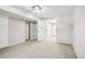 Spacious finished basement featuring neutral carpet and access to multiple rooms at 1707 Ostia Cir # 46, Lafayette, CO 80026