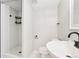Bathroom featuring walk in shower, sleek white tile, and a modern vanity at 1707 Ostia Cir # 46, Lafayette, CO 80026