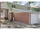 Charming two-story townhouse featuring a brick facade and attached one car garage at 1707 Ostia Cir # 46, Lafayette, CO 80026