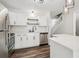 Updated kitchen featuring white cabinets, stainless appliances, and stylish backsplash at 1707 Ostia Cir # 46, Lafayette, CO 80026