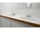 Bright bathroom features a double sink with chrome fixtures, providing ample space at 655 N Pearl St # 208, Denver, CO 80203