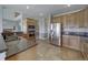 Spacious kitchen with stainless steel appliances and ample counter space at 8441 Flint Ridge St, Bennett, CO 80102