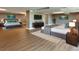 Large bedroom with two beds, dark wood floors, and ample natural light at 17826 E Cloudberry Dr, Parker, CO 80134