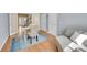 Clean bedroom with hardwood floors, natural light, and neutral decor at 17826 E Cloudberry Dr, Parker, CO 80134