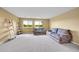 Upstairs living room featuring plenty of seating and natural light at 17826 E Cloudberry Dr, Parker, CO 80134