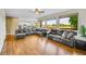 Open living area with expansive windows offering natural light and view to the exterior at 17826 E Cloudberry Dr, Parker, CO 80134