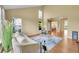 Bright living room with high ceilings and views of the backyard at 17826 E Cloudberry Dr, Parker, CO 80134
