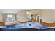 Bright living room with high ceilings and many windows at 17826 E Cloudberry Dr, Parker, CO 80134