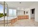 Luxurious bathroom with double sinks, a tub, and a separate shower with a glass door at 17826 E Cloudberry Dr, Parker, CO 80134