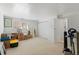 This spacious basement has carpet flooring and plenty of room for storage at 27231 Log Trl, Conifer, CO 80433