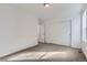 Carpeted bedroom featuring lots of bright light and a large closet at 537 Nightsky St, Erie, CO 80516