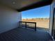 Covered deck overlooking an open yard at 537 Nightsky St, Erie, CO 80516