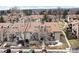 Community aerial view showcasing well-maintained townhomes and green spaces at 7770 W 87Th Dr # F, Arvada, CO 80005