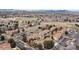 Aerial view of a residential community near open spaces and amenities at 7770 W 87Th Dr # F, Arvada, CO 80005