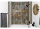Stylish shower with designer tiles and modern fixtures for a spa-like experience at 7770 W 87Th Dr # F, Arvada, CO 80005