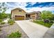 Beautiful home with manicured landscaping, long driveway, and welcoming front entrance at 3855 Old Oaks St, Castle Rock, CO 80104