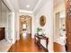 Inviting foyer with hardwood floors, tray ceilings, and elegant decor at 3855 Old Oaks St, Castle Rock, CO 80104