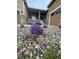 Landscaped front yard with rocky features, garden details, and an inviting entrance at 3855 Old Oaks St, Castle Rock, CO 80104
