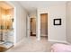 Hallway featuring a bedroom, bathroom, and walk-in closet at 3855 Old Oaks St, Castle Rock, CO 80104