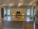 Bright kitchen featuring a large island, granite countertops, stainless steel appliances, and ample cabinet space at 3855 Old Oaks St, Castle Rock, CO 80104
