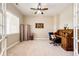 Comfortable office space with carpet, a window for natural light, and desk at 3855 Old Oaks St, Castle Rock, CO 80104