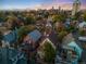 Scenic aerial view of diverse housing with a downtown skyline in the distance, highlighting the vibrant community at 408 E 1St Ave, Denver, CO 80203