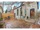 Private backyard featuring a stone patio and access to an outdoor door at 408 E 1St Ave, Denver, CO 80203