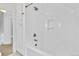 Bright bathroom with a white subway tile surround bathtub at 408 E 1St Ave, Denver, CO 80203