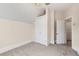 Empty bedroom with closet and an doorway at 408 E 1St Ave, Denver, CO 80203