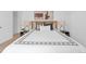 Comfortable bedroom featuring a king bed, stylish linens, and modern lamps at 408 E 1St Ave, Denver, CO 80203