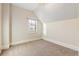 Empty bedroom with plush carpet and a large window at 408 E 1St Ave, Denver, CO 80203